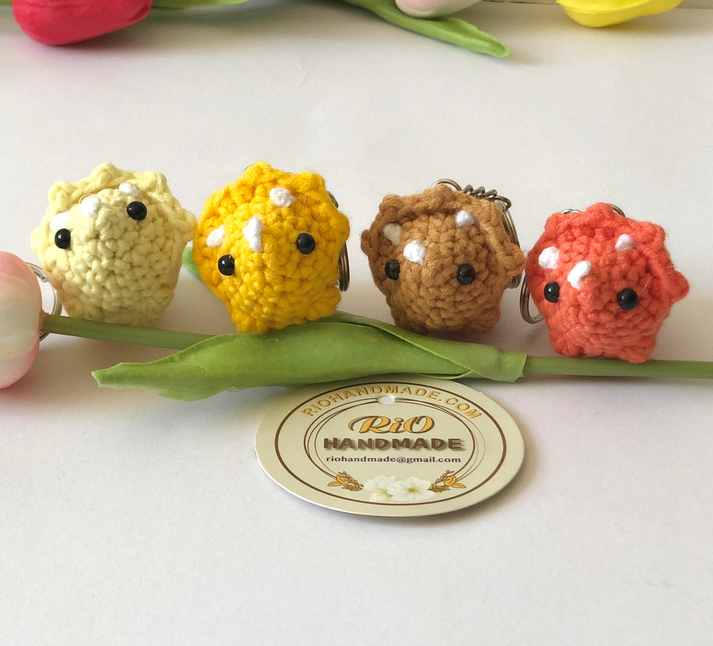 Handmade tiny triceratops, crochet Dinosaur, amigurumi triceratops, plushie toy, gift, ornament, keychain.